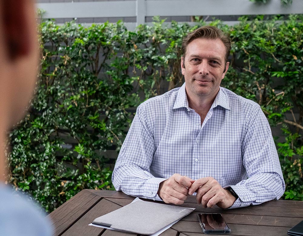 lawyer and client discussing an application to vary